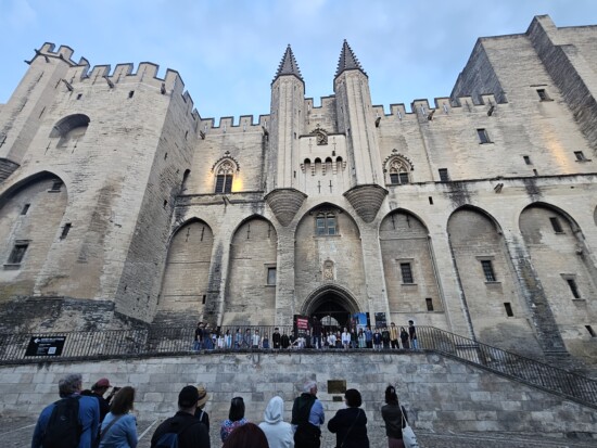 The high school singers performed at the Palace of the Popes during their international choir tour.