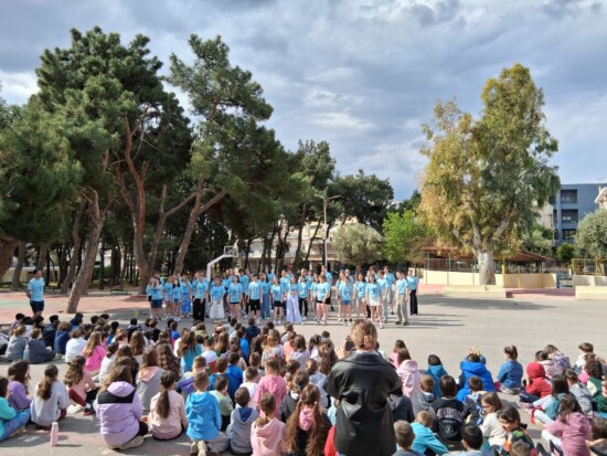 The choir singers performing at a primary school near Athens during their performance tour of Greece. 